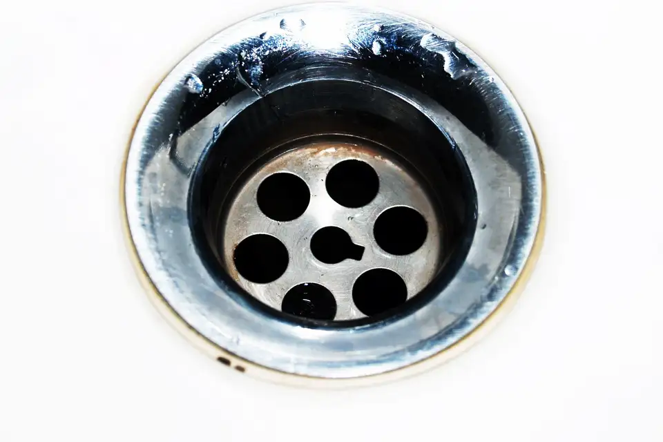 Close view of a chrome sink drain